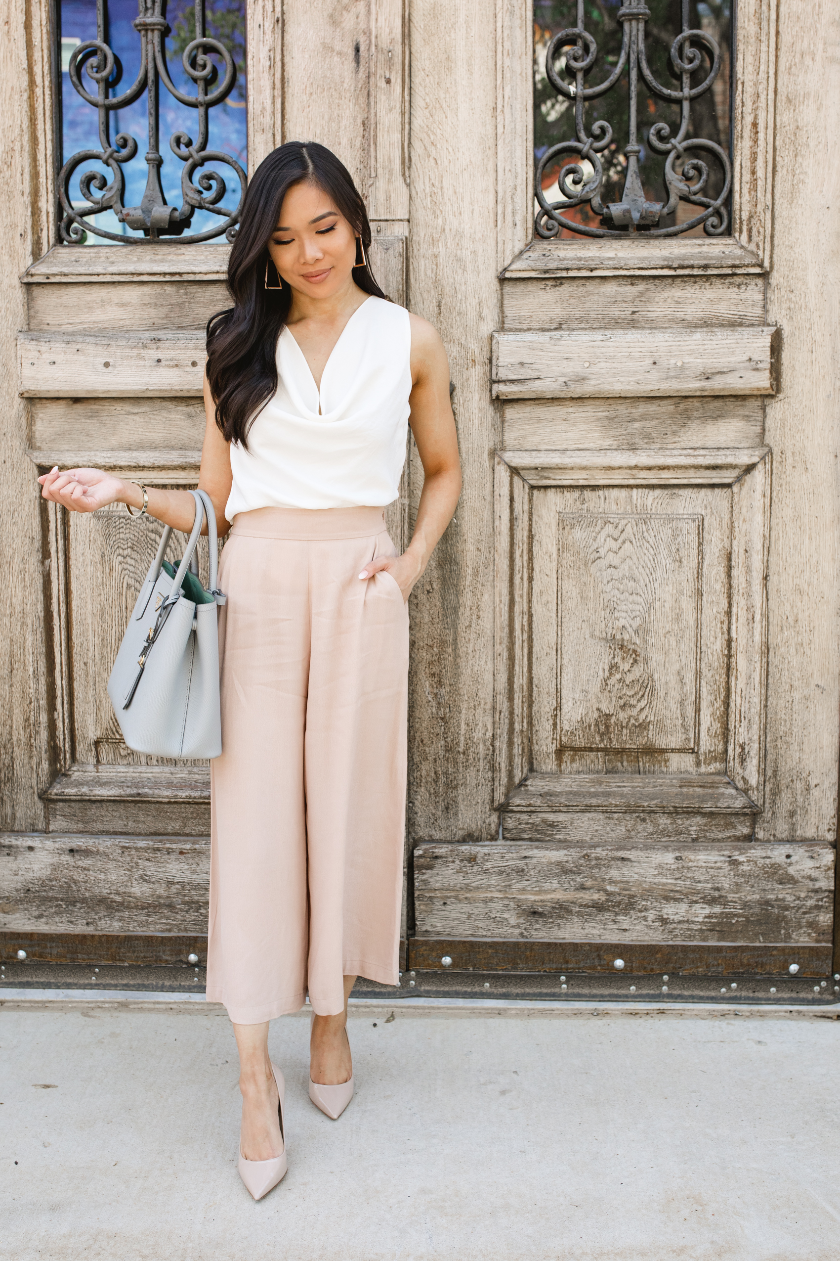 Workwear outfit inspo with nude wide-leg cropped pants, white blouse and nude heels