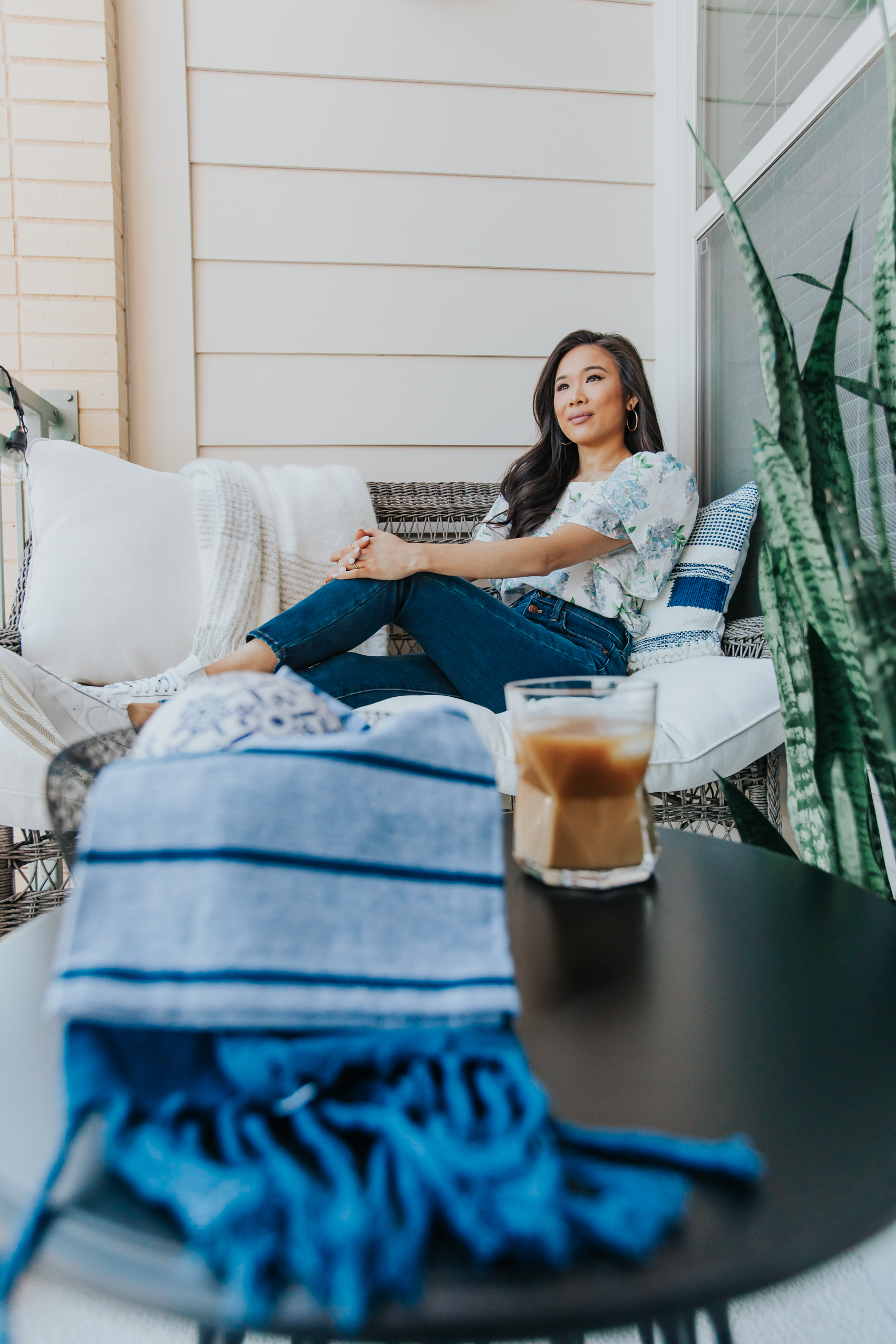 Blogger Hoang-Kim in her Dallas apartment balcony patio space