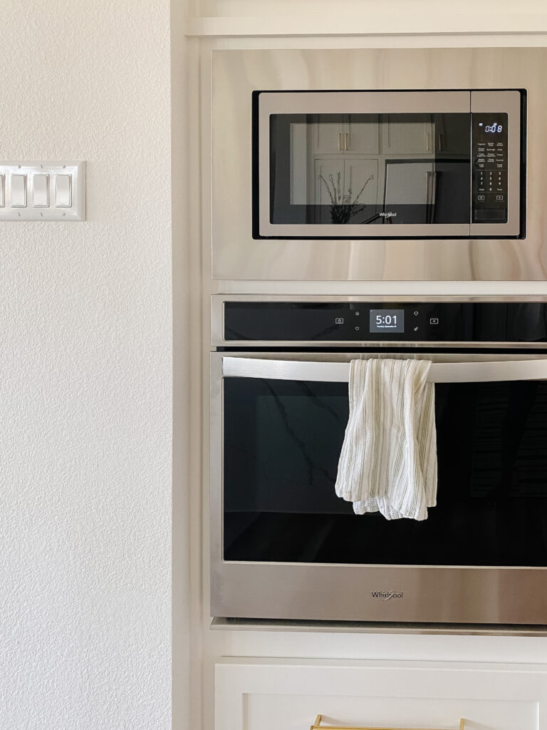 Blogger Hoang-Kim Cung shares a Cafe Appliances review featuring her transitional white kitchen